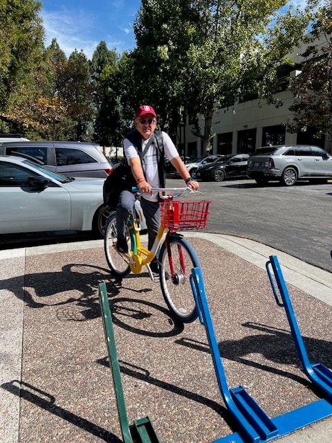 Deven on a bike at Google campus — exploring innovation and active transit