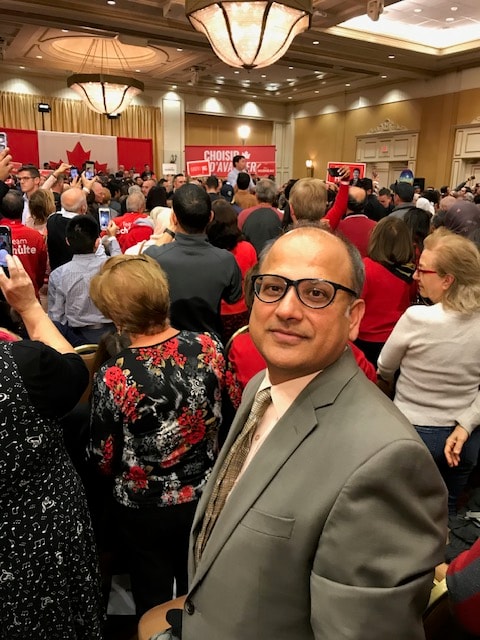 Deven at a federal political rally — engaged in Canadian democracy