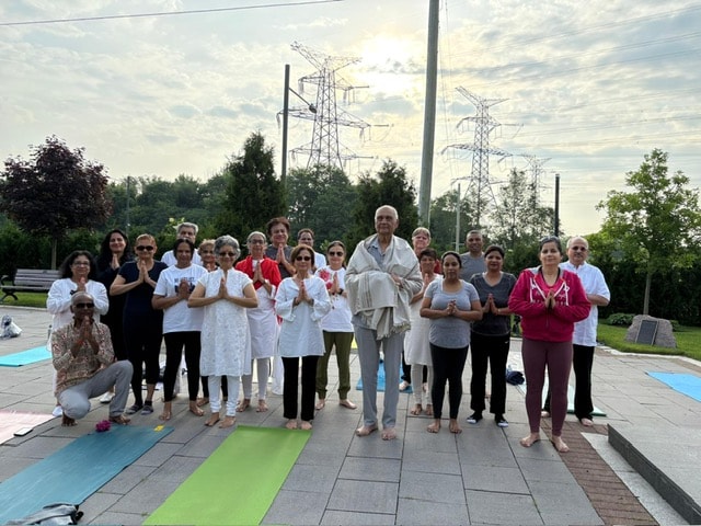 Community yoga gathering in Ward 4